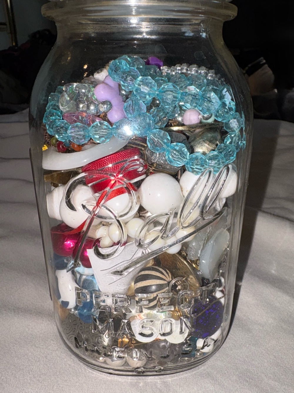 Decorative Mason Jar Filled with Colorful Beads